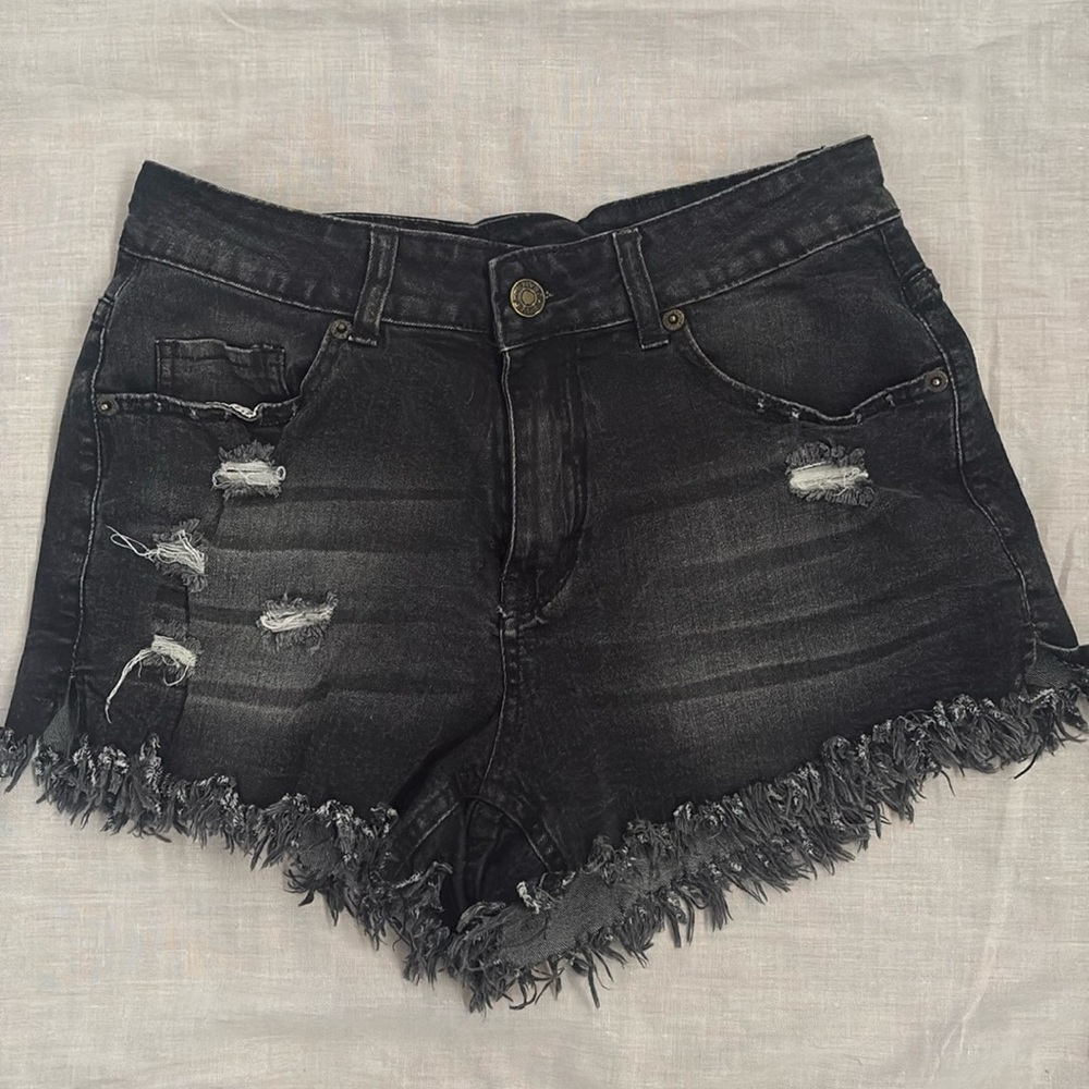 Black Jean shorts, unsure of size or brand, but fit as a 2!